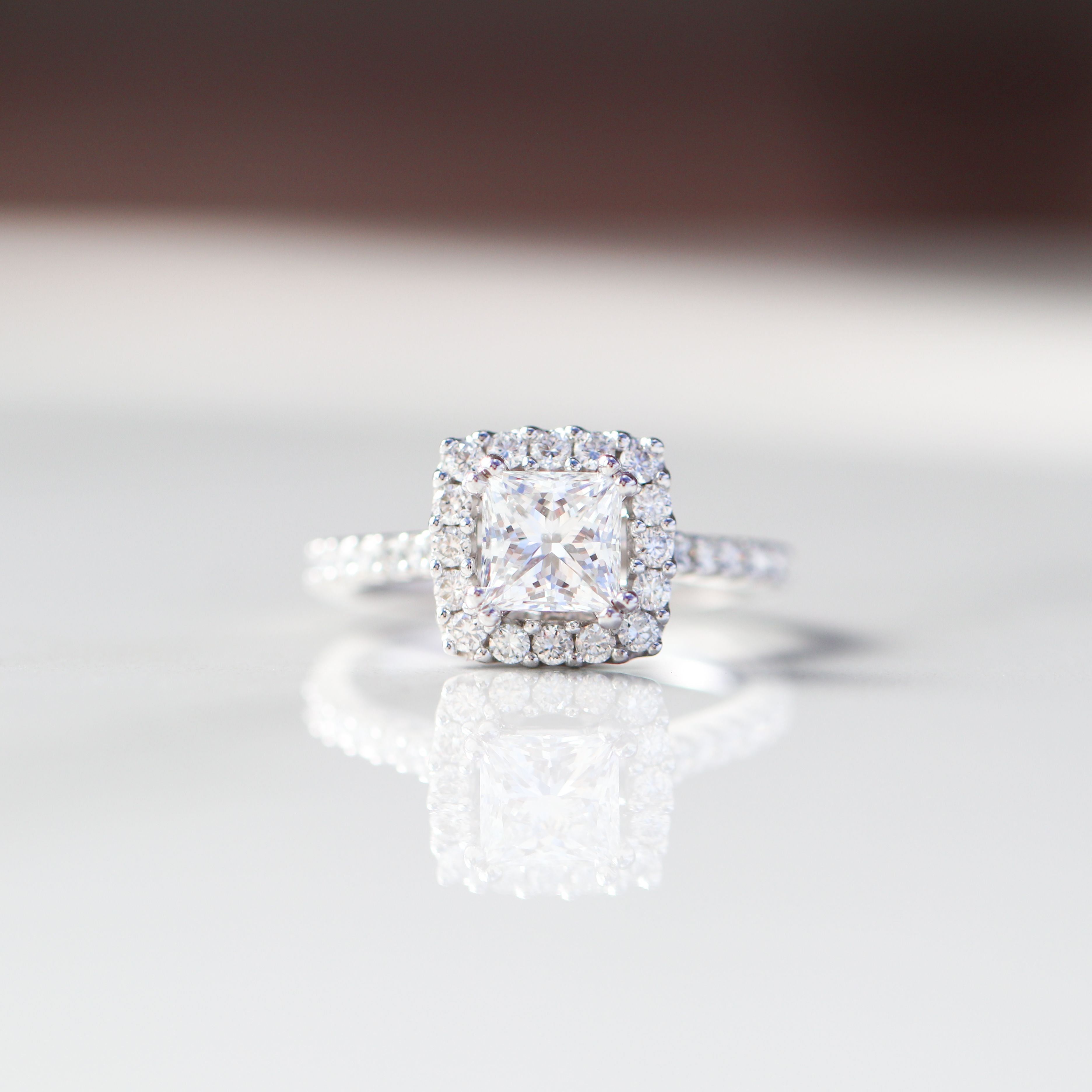 Princess Cut Engagement Ring 18kt WG 3.55gr Band Natural 0.59cttw / PC Center Stone LAB 1.10ct VVS2 - E Cert IGI # LG693513696 Size 6 RN00208